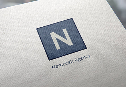 Nemecek Agency logo printed on a paper